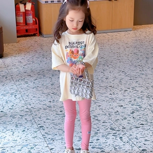 Silver beaded handbag for kids styled with casual cartoon t-shirt and pink pants