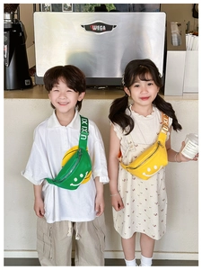 Kids waist bags in green and yellow with a 3D smiley face and lettered straps