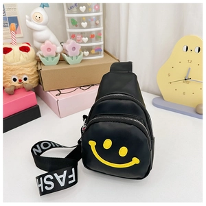 Close-up of black PU leather kids chest bag with yellow smiley face and fashion strap