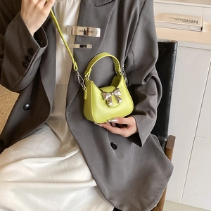 Mini sac à bandoulière jaune fluo avec nœud métallique argenté pour filles