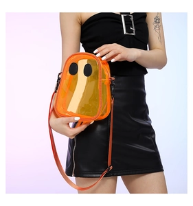 Detailed view of an orange transparent ghost-shaped PVC crossbody bag for kids