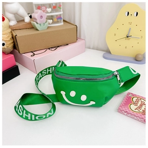Detail of neon green nylon waist bag with smiley face and FASHION letter strap