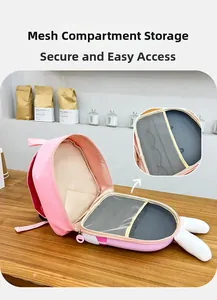 Internal mesh pocket divider detail of a pink rabbit ears kids school backpack