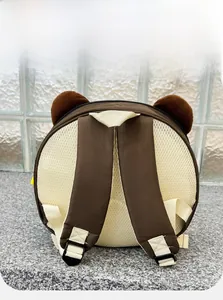 Detail of breathable mesh back panel and padded straps on brown bear toddler backpack