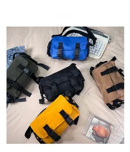 Detailed view of children's vintage nylon messenger bags in five vibrant colors