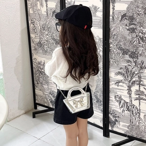 Girl's silver laser mini handbag with bow detail and metallic chain strap