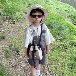 Kids trendy drawstring crossbody bucket bag for outdoor activities in summer style