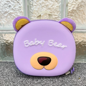Detail of purple EVA bear backpack showing 3D ears, Baby Bear text, and top handle