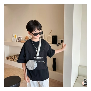 Detail showing a mini silver metallic round crossbody bag with 'COOL' lettering for boys