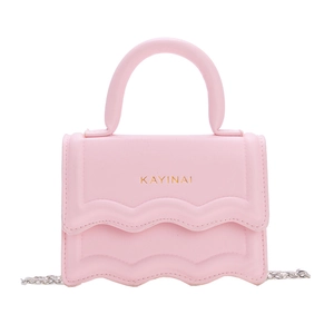 Pink mini crossbody bag for girls featuring a wavy quilted flap and gold logo
