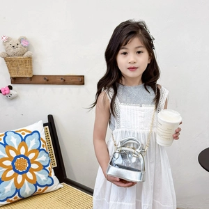 Silver shell-shaped jelly bag for girls with transparent PVC and golden metal chain strap