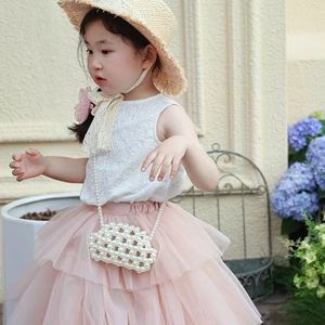 Cute white lace vest and pink tulle skirt set for girls with a pearl cloud crossbody bag