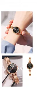 Gros plan montre GEDI vintage à quartz avec cadran cœur noir et bracelet en or rose