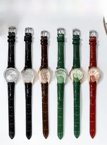 Close-up of luxury women quartz watches with diamond bezels and leather strap variants