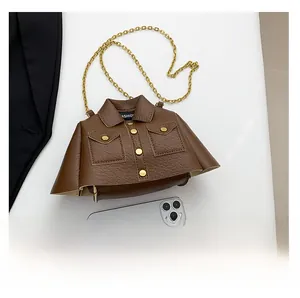 Detail of creative brown lychee texture jacket-shaped bag with a smartphone for scale