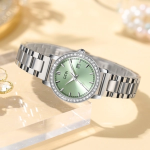 GEDI luxury women's watch with mint green dial and diamond-set silver steel band