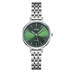 Montre à quartz minimaliste pour femme avec cadran vert soleil et bracelet en acier argent