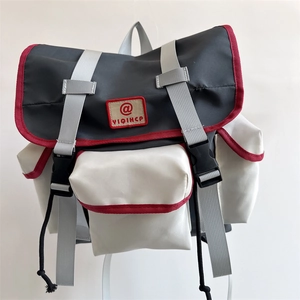 Outdoor school backpack with contrast gray and white design and red trim details