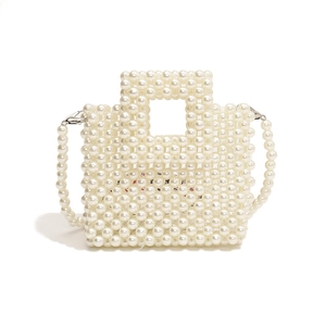 Elegant white faux pearl beaded handbag with unique square cutout handle for formal events