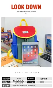 Detail view of colorful nylon kids backpack with size comparison to a tablet device