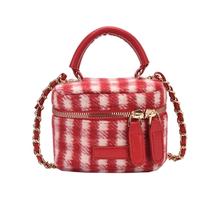 Mini red and white plaid bucket bag with gold chain strap and top leather handle