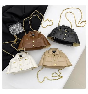 Creative jacket-shaped crossbody bags in four colors with gold chains and pebble leather