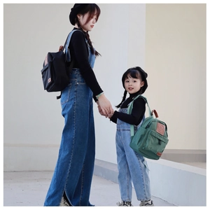 Parent-child matching canvas backpacks in green and black with cute smiley patch