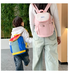 Rear view of color-block lightweight nylon backpacks for children and adults