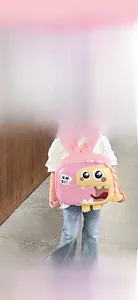 Pink cartoon dinosaur eggshell backpack for kids with wide padded S-shaped shoulder straps