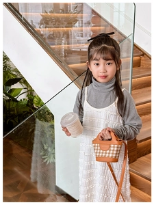 Girls retro brown plaid mini handbag styled with fashion outfit on stairs
