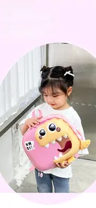 Detail of pink 3D dinosaur backpack with big eyes and cute teeth for kids and toddlers