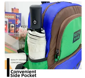 Detail showing the convenient mesh side pocket of the kids backpack holding a folding umbrella