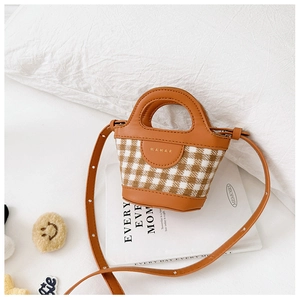 Detail of mini plaid tote bag with MAHAR logo, vintage children's fashion accessory
