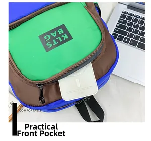 Practical front pocket detail of color-block kids backpack for school storage