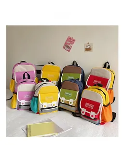 Detail of color-block canvas school bag with safety reflective strips and side pockets