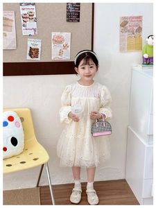 Detailed view of girls princess dress set with star sequins, headband, and mini handbag