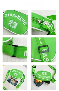 Detail of green nylon crossbody bag with zipper, adjustable strap and white text print