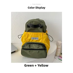 Détail du sac à dos enfant vert et jaune résistant à l'eau avec écusson logo