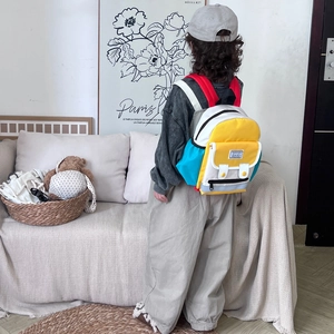 Colorful multi-pocket kids backpack with adjustable straps for school or hiking