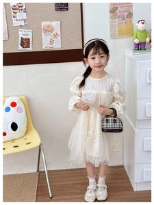 Elegant white tulle princess dress with golden star sequins and houndstooth handbag