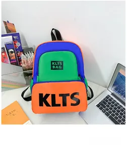 Detail of color-block children's backpack featuring KLTS letter print and durable zippers
