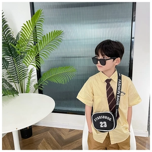 Detail of kids nylon crossbody bag with STARSBRUG 23 print and fashion lettered strap