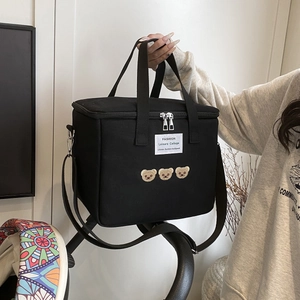 Fashionable black mama bag with bear embroidery and adjustable shoulder strap