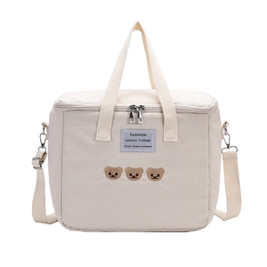 Insulated diaper bag in beige canvas with cute bear embroidery and adjustable strap