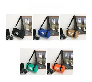 Detail showcasing five color options of the cylindrical canvas crossbody bag for kids