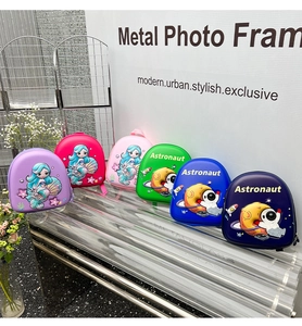 Detailed collection of hardshell egg-shaped kids backpacks with mermaid and astronaut themes