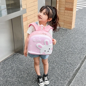 Pink eggshell backpack for kids with a cute 3D bunny and ergonomic straps