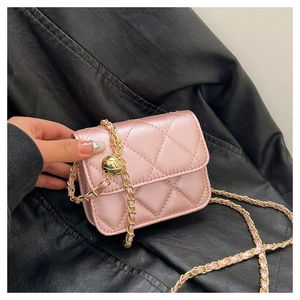 Detail of pink quilted mini crossbody bag with gold chain and adjustable bead charm