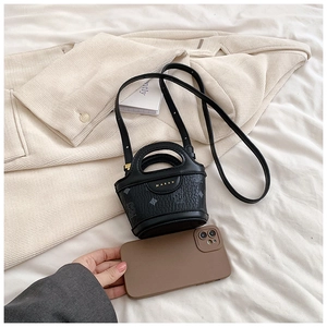 Mini black bucket bag with vintage monogram and gold MARAH logo shown next to a phone