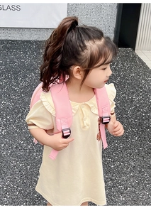 Detail of pink toddler bird backpack showing adjustable shoulder straps and durable fabric